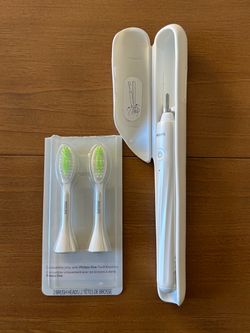 Philips battery teeth brush with 2 head replacement