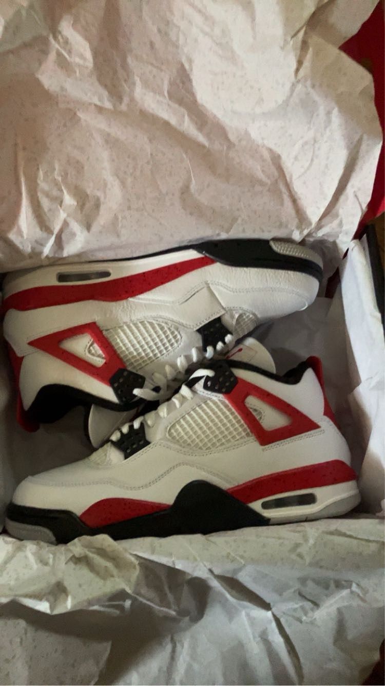 White and red Jordan 4 