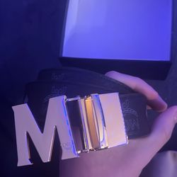 black mcm belt with silver buckle 