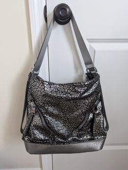 Silver Purse Backpack With Multi Purpose Strap