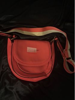 Pink saddle crossbody purse