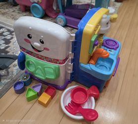Fisher-Price Laugh & Learn Learning Kitchen playset. 