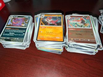 100 holo/reverse holo Pokemon cards