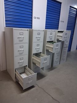 Metal file cabinet with key letter size $70 each