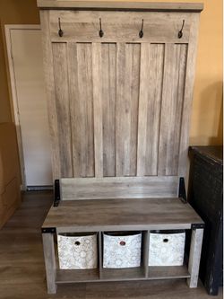 Bench with cubbies and coat holders