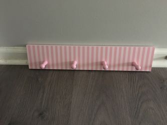 Girls room clothes hanging wall mount