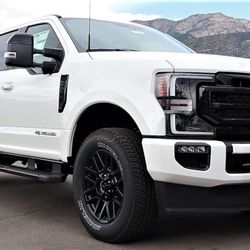 20" FORD F-250 F-350 BLACK OEM WHEELS AND MICHELIN TIRES