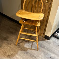Wood high chair.