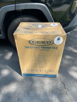 Brand new, never opened Graco High chair