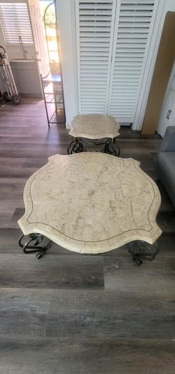 Two matching granite top tables