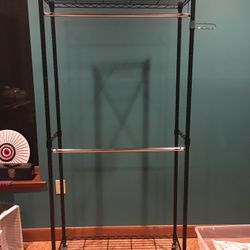 Rolling metal garment rack clothing rack