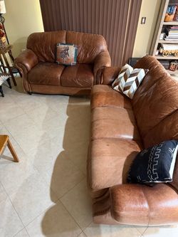 Leather couch and loveseat