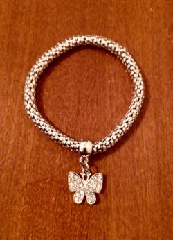 BRAND NEW IN PACKAGE LADIES DANGLING SILVER BUTTERFLY CHARM SLIP-ON SHINY RHINESTONE BANGLE BRACELET