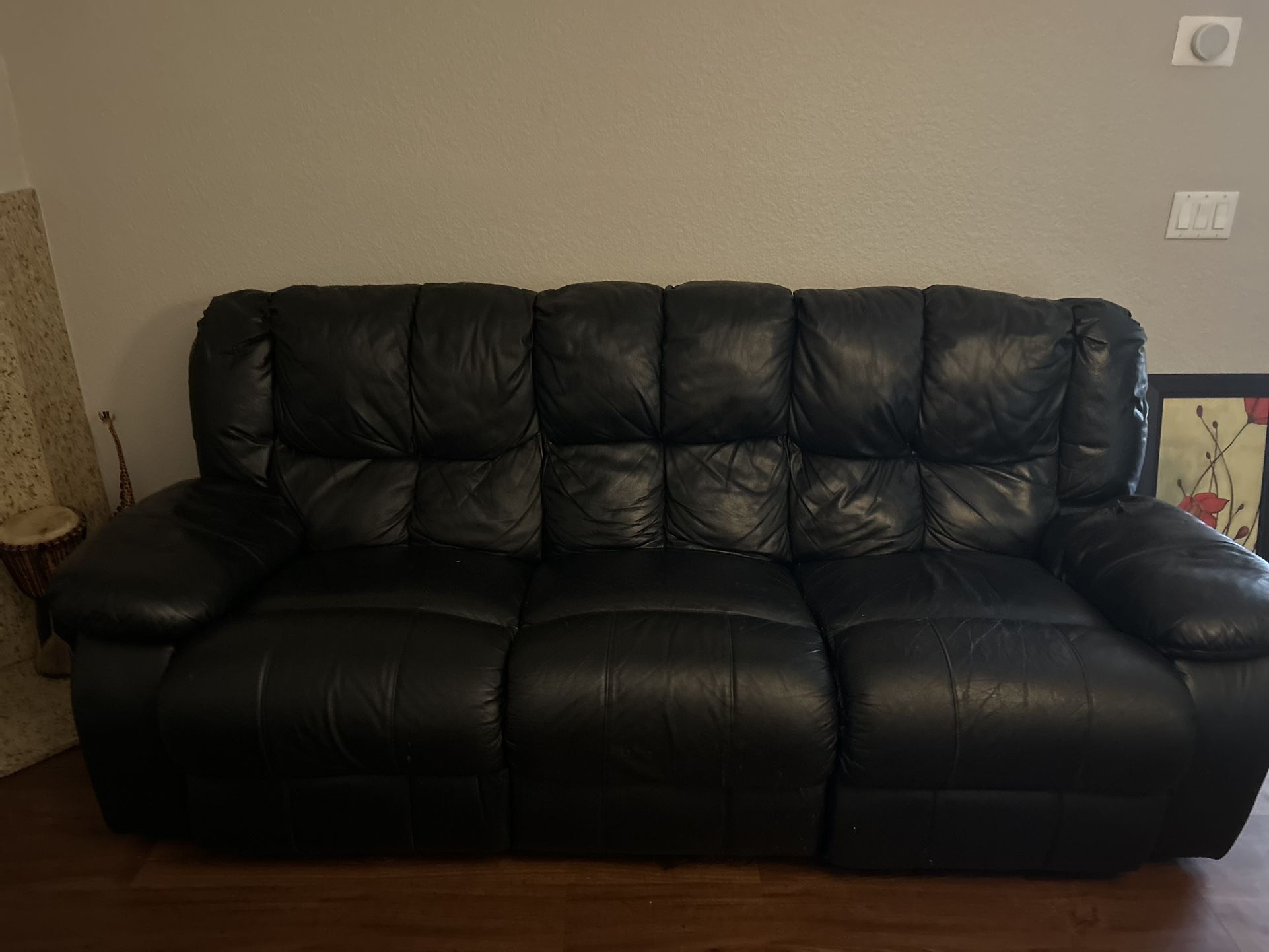 Leather 8 Foot Black Recliner Sofa.