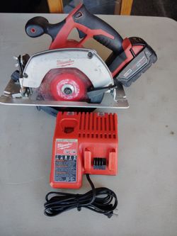 Milwaukee saw, battery, charger