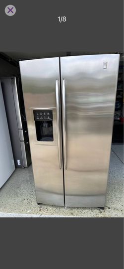 Brand new side by side GE refrigerator