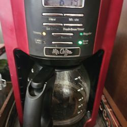 Dark Red With Black.  Works Great.  Pick Up 