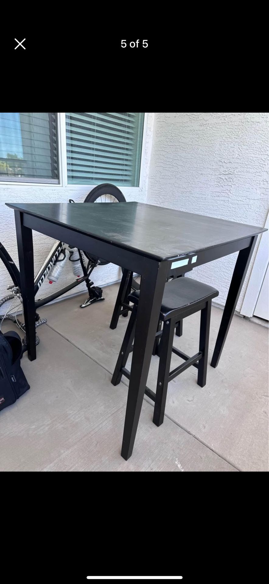 Black Wooden Table With Bar Stools