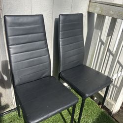 2 Black Chairs $10