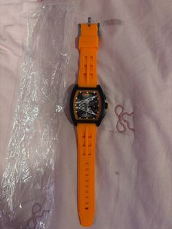 Orange skelleton men’s watch