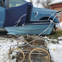 Vintage Silver Cross Pram