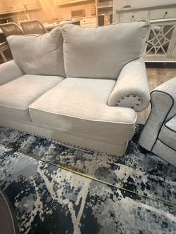 Two Light Gray Fabric Sofas with Nailhead Trim