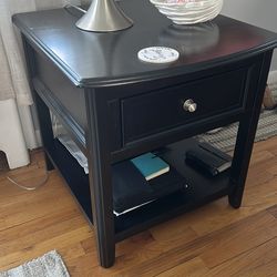 Set of 3 living room tables 2 end and a center table.