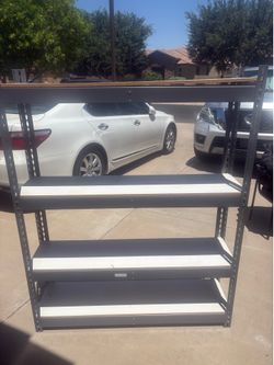 $40 4 rack metal base/ wood shelves