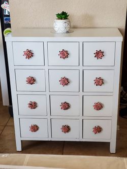 White Wood Dresser with Flower Knobs