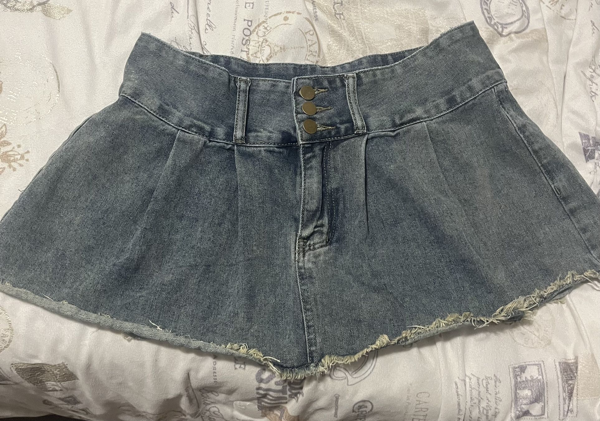 Distressed denim skirt