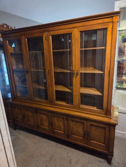 2 piece long wooden china cabinet made by White Furniture Co., excellent condition