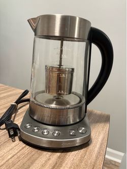 Electric tea kettle with tea infuser