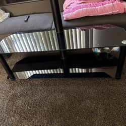 BLACK GLASS TV STAND WITH 50 INCH SAMSUNG TV