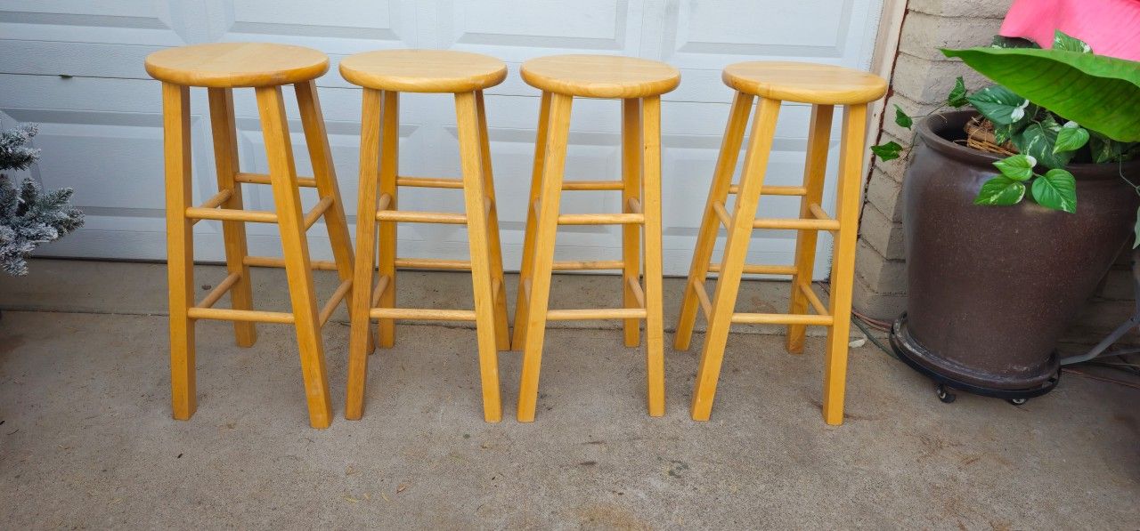 **4 Honey Color Wooden Stools **