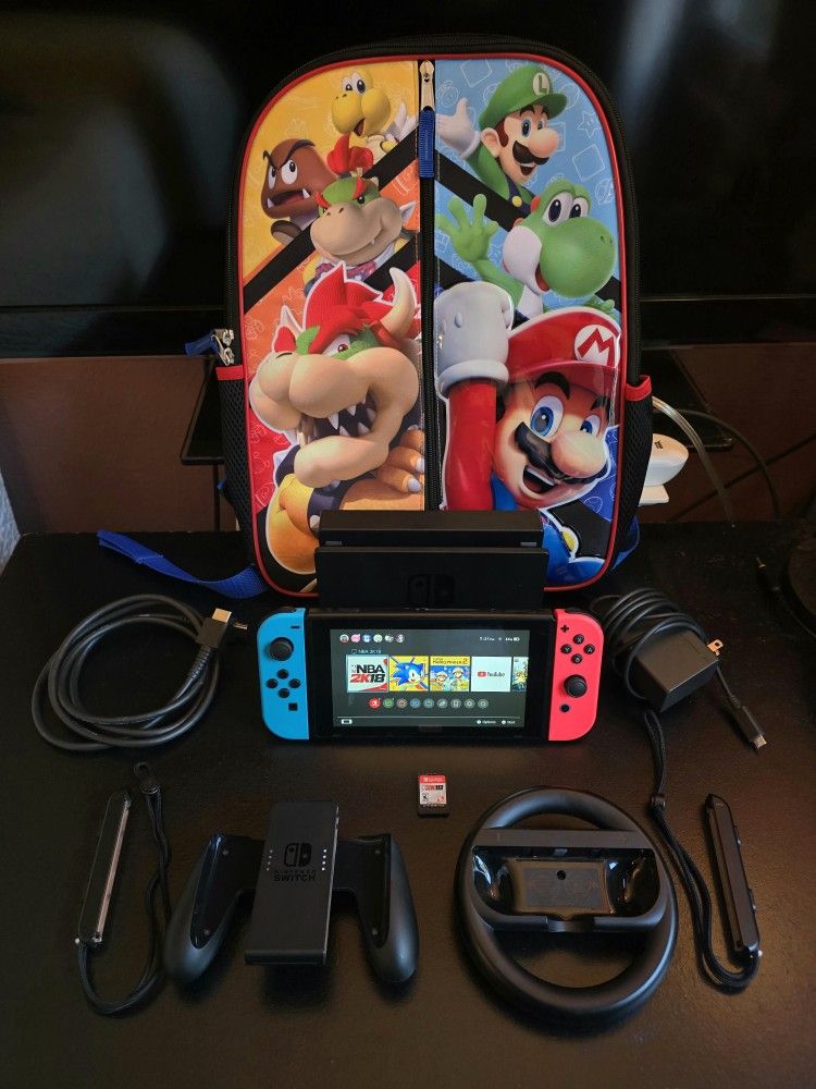 Nintendo Switch + Accessories + Game