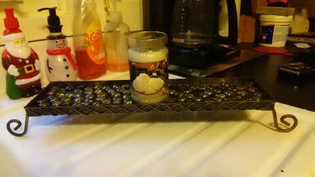 Long metal candle holder