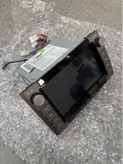 21 Toyota tundra audio unit with conversion harness.