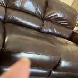two leather brown couches