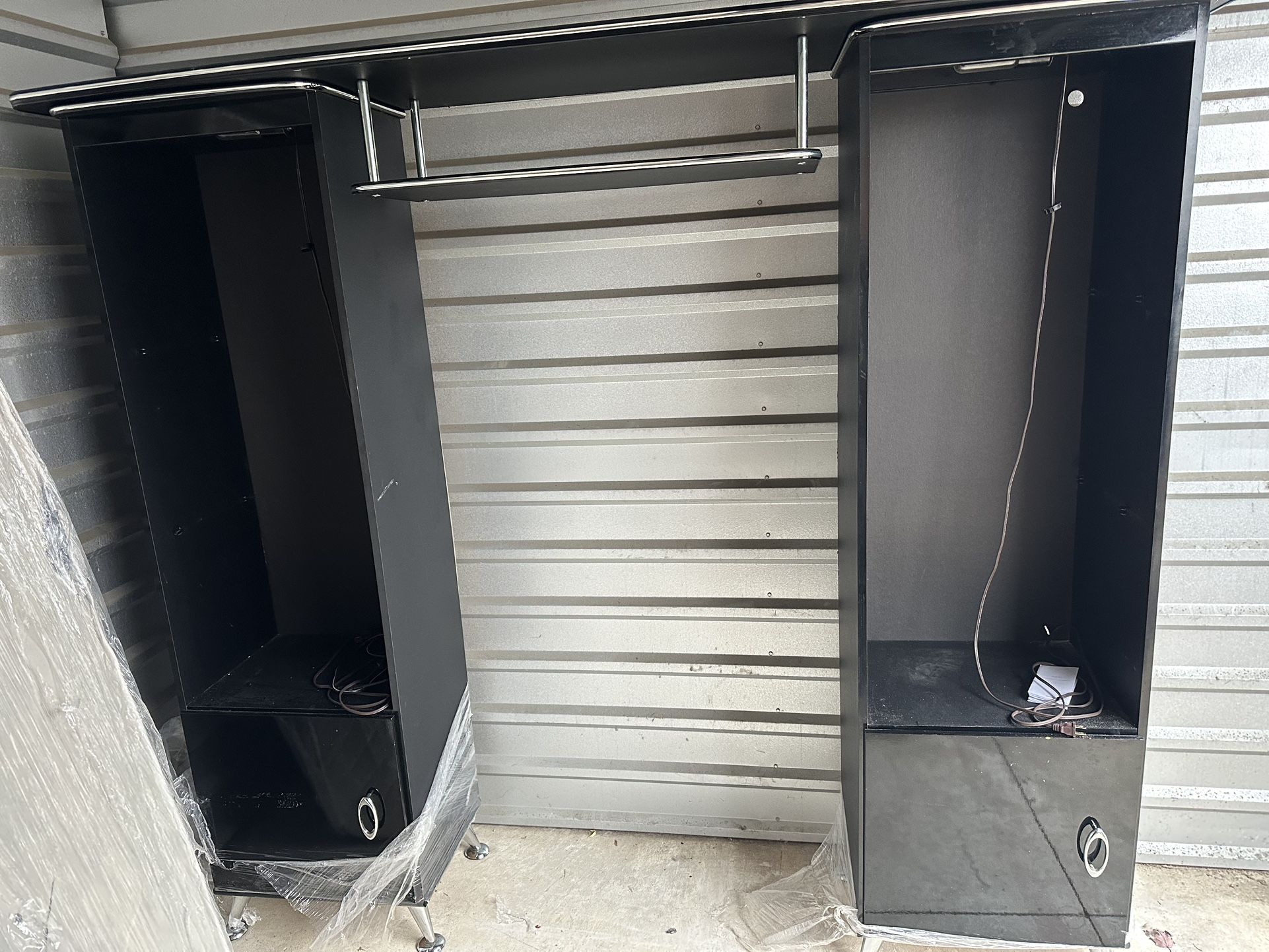 Black Wood Wall Unit, Silver Trim On Top Part.