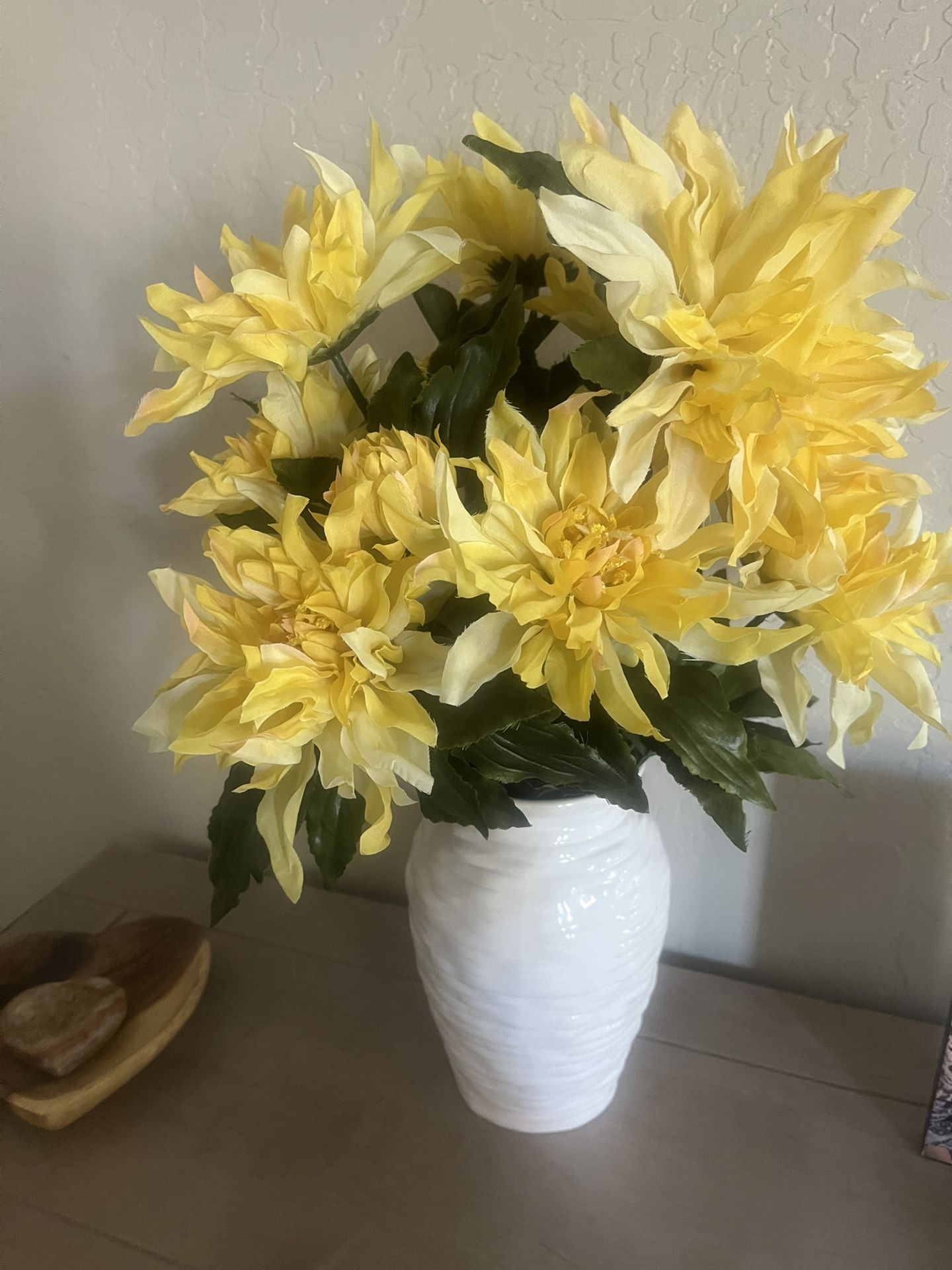 Yellow Flowers In Beige Vase