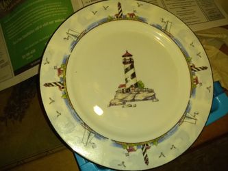 Variety of decor plates n lighthouse dishes