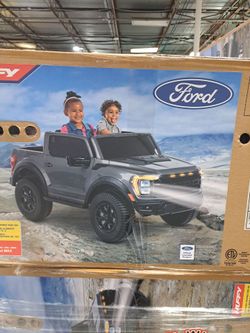 Huffy 12V Ford 150 Raptor ride on truck NEW