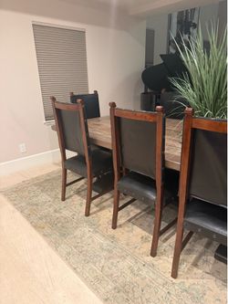 Dining table with eight chairs
