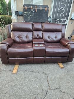 Leather reclining loveseat