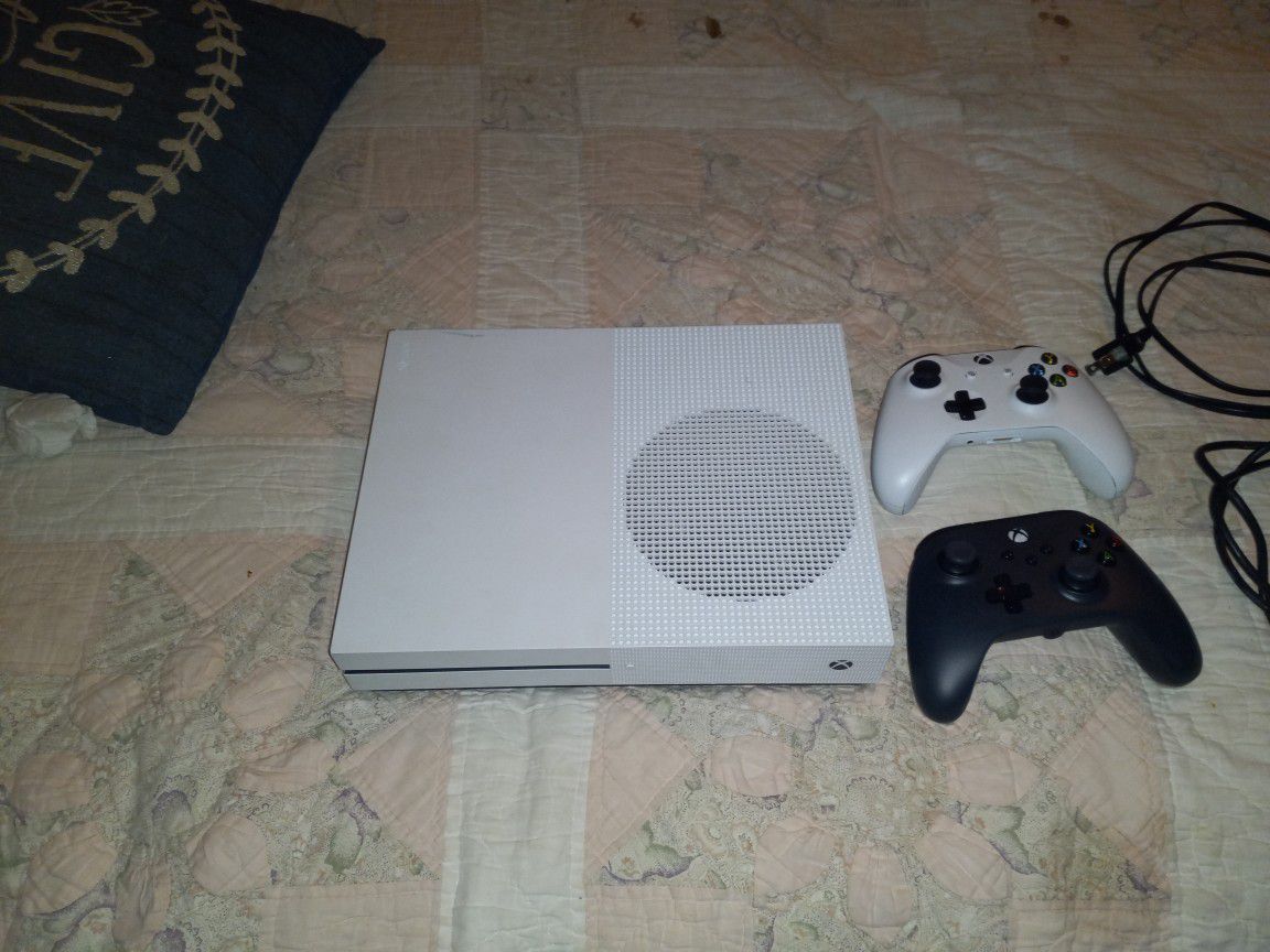 Xbox One S With a Black Wired Controller With All Cables