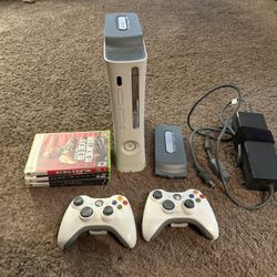 Xbox 360, 2 Controllers, And Games.