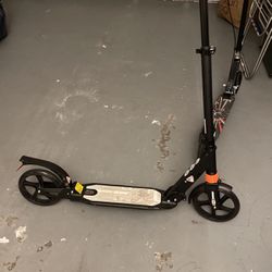 Scooter With Stand Gets Taller 