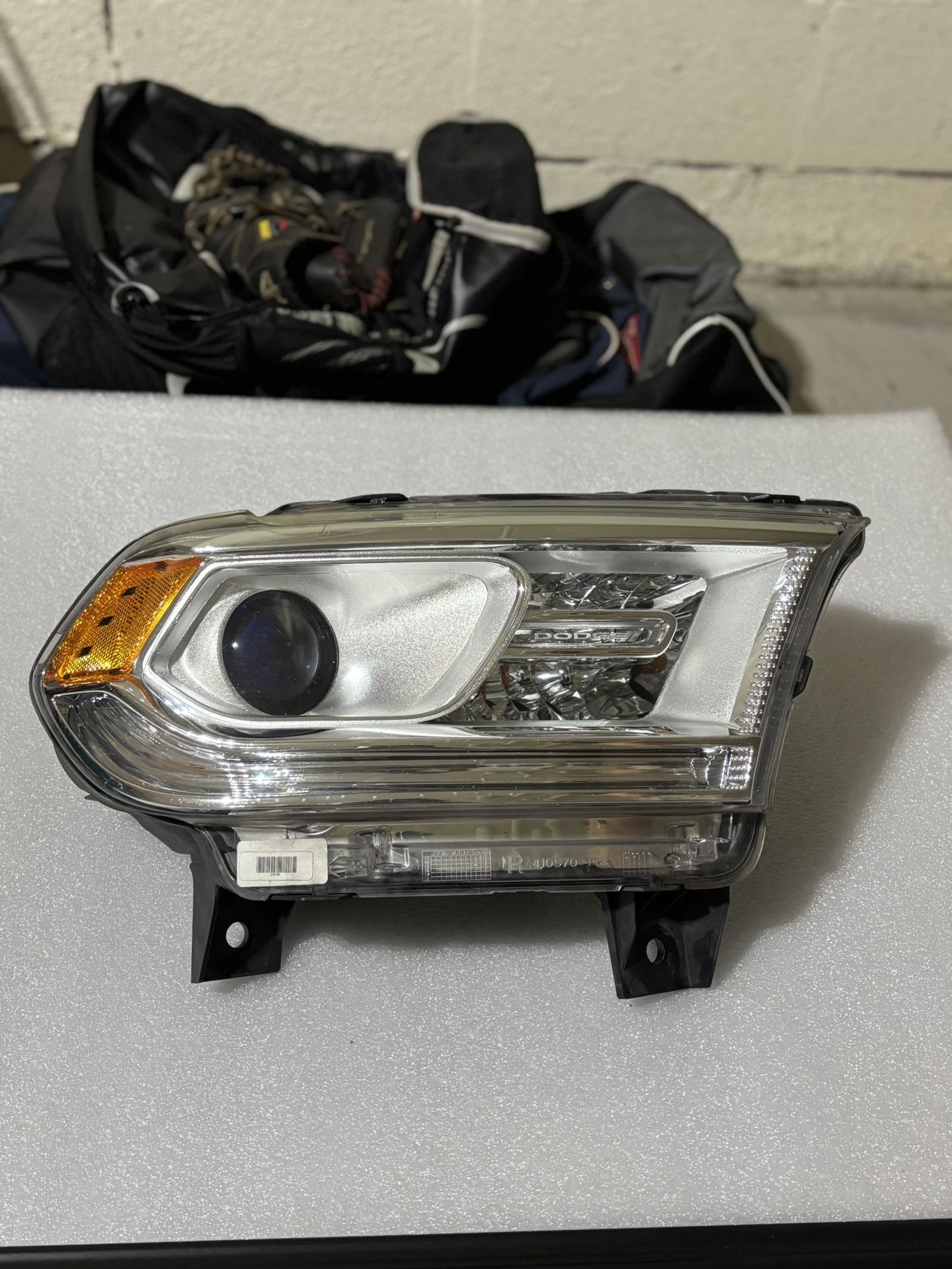 2017 Dodge Durango - Original Headlight (Passenger Side) - Fogs occasionally when it rains.