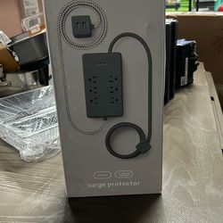 heyday 6-Outlet Surge Protector with a 6-foot extension cord.