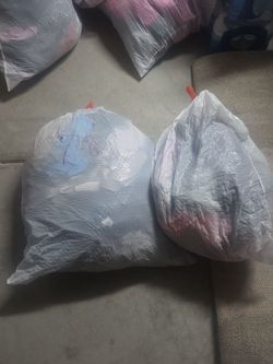 2 bags of kids clothing